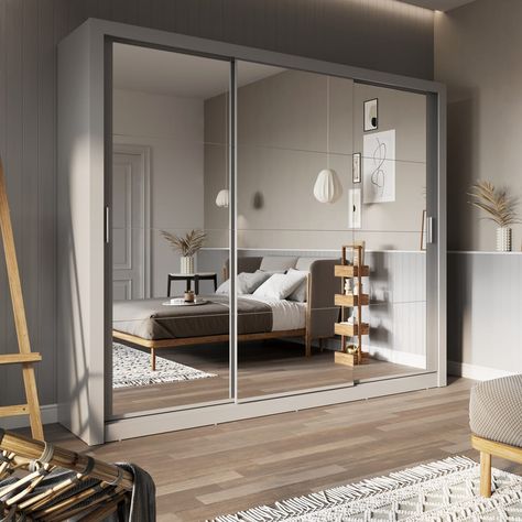 Elevate your bedroom’s style with the Idea 20 - 3 Sliding Door Wardrobe. The mirrored sliding doors not only provide a sleek look but also reflect light, making your space appear larger and brighter. Inside, six sturdy shelves and two hanging rails offer ample storage for clothing and accessories, keeping your room organised. Crafted from high-quality laminated board, this wardrobe is durable and built to last, with versatile removable shelving that allows you to customise your storage space. FE Glass Sliding Doors For Wardrobe, Room Decor Bedroom Wardrobe, Fitted Wardrobe Ideas With Mirror, Cubords Ideas Bedroom Sliding Door, Mirror Cubords Ideas Bedroom, 3 Door Wardrobe Design Inside, Room Wardrobe Design With Mirror, Mirror Wardrobe Bedroom, Cubords Ideas Bedroom