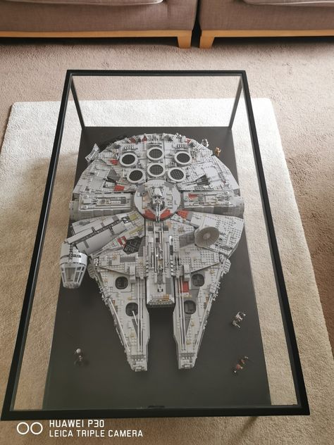 Star Wars Display Ideas, Lego Star Wars Room, Nerdy Living Room, Lego Coffee Table, Lego Living Room, Lego Millenium Falcon Coffee Table, Millenium Falcon Table, Lego Star Wars Collection Display, Lego Set Display