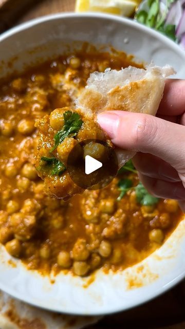 Sara l Nutrient Matters on Instagram: "If you’re looking for a plant-based meal to add to your weekly rotation, chana masala is a classic that just about anyone can enjoy 🙌🏽 This also stores incredibly well in the fridge, making it perfect for a quick lunch throughout the week! 

Recipe ⬇️
2 large tomatoes 
2 tbsp Ghee 
1 Red onion 
2 cardamon pods 
1 bay leaf 
4 (large) garlic cloves (minced)
2” ginger (grated)
1 tsp Ground coriander 
1 tsp garam malasa 
1 tsp Red Chili powder 
1 tsp Paprika 
1 tsp curry powder 
1/2 tsp Cumin AND 
1/4 tsp turmeric 
Tomato pure (1.5-2 cups tomato liquid)
Salt & pepper 
1 can chickpeas 
1 cup water 

Garnish & toppings: 
Heavy cream 
Cilantro 
Lemon juice 
Red onion (slices)" Chickpea Meals, Dinner Recipes Vegetarian Indian, Indian Lunch Recipes, Dizzy Cook, Chana Masala Recipe, Indian Cuisine Recipes, Curry Food, Lunch Recipes Indian, Indian Dinner Recipes