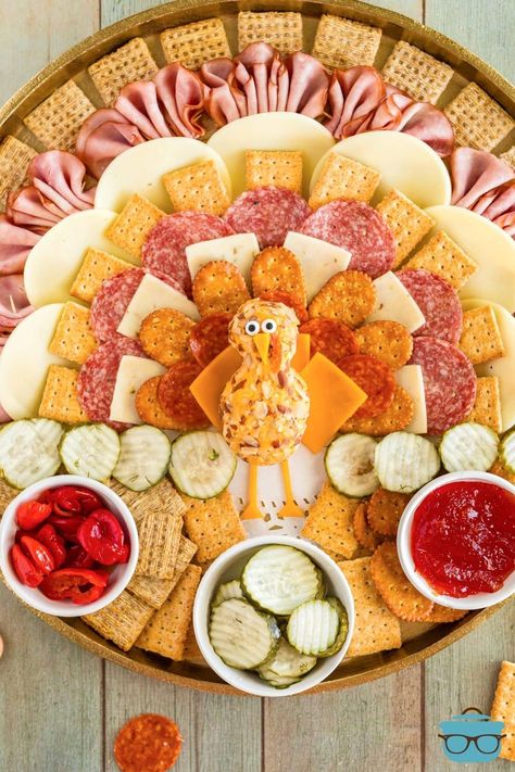 Looking down on a Thanksgiving Turkey Charcuterie Board. Thanksgiving Crackers And Cheese, Thanksgiving Turkey Charcuterie Board, Thanksgiving Charcuterie Board Turkey, Charcuterie Turkey, Turkey Shaped Charcuterie Board, Turkey Cheese Board, Turkey Charcuterie Board, Turkey Charcuterie, Turkey Board