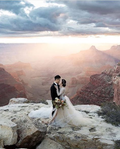 If this mystical Grand Canyon wedding doesn't stir something within you we don't know what will! So much love for the light the dress and the dreamy organic bouquet from @bybloomers! . photo @tylerrye_ ribbons @froufrouchic Grand Canyon Wedding, Canyon Wedding, Intimate Ceremony, Couple In Love, Sunset Wedding, The Grand Canyon, Arizona Wedding, Vegas Wedding, Adventure Wedding