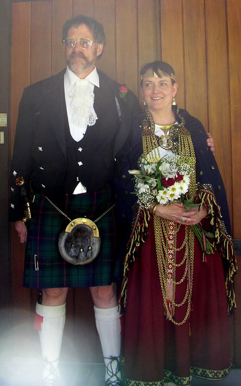 Our Scottish/Latvian Wedding. Alastair is wearing the formal Scottish outfit with the Davidson tartan and I am wearing the Latgallian 7 - 13th century outfit borrowed from my friend Ilze. Latvian Wedding, Scottish Outfit, Latvian Symbols, Society For Creative Anachronism, Scottish Clothing, British Wedding, National Costume, People Of The World, The Borrowers