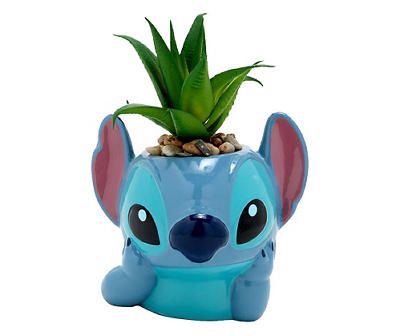 This charming potted faux succulent adds happy vibes to any office, living room or bedroom space with its Stitch design inspired by Disney's Lilo & Stitch. With brown pebbles, realistic details and a character theme, this arrangement makes a maintenance-free and easy botanical addition to any fan's decor. Stitch Things, Jungle Bedroom, Lilo And Stitch Merchandise, Disney Room Decor, Stitch Toy, Disney Rooms, Lilo Y Stitch, Ceramic Planter Pots, Lilo Et Stitch