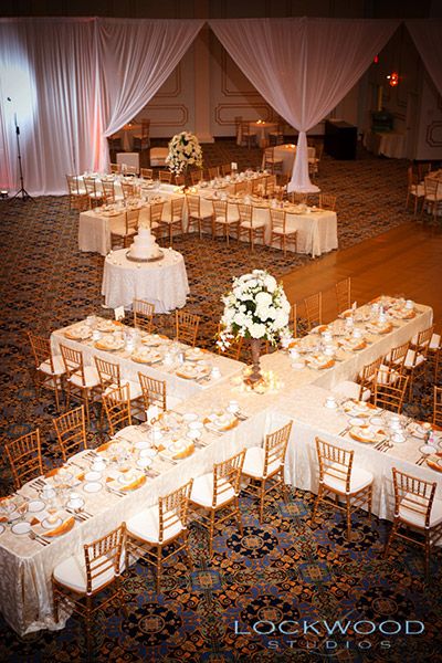 X-shaped tables not only add major "wow" factor but they also help you save a bundle on centerpieces. Reception Seating, Table Set Up, Christian Wedding, Table Arrangements, Banquet Hall, Tampa Florida, Wedding Wishes, Wedding Planners, Here Comes The Bride