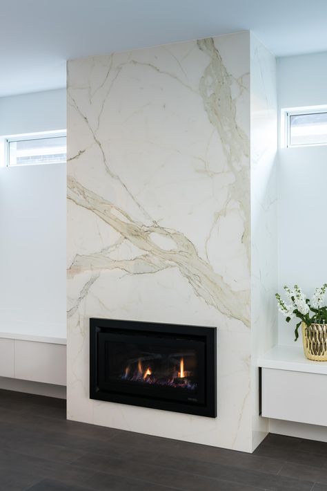 Staturio Porcelain sheet Tile Fireplace Ideas, Tiled Fireplace Wall, Black Tile Fireplace, Caesar Stone, Contemporary Fireplace Designs, Fireplace Feature Wall, Marble Products, Living Room Decor Fireplace, Bedroom Fireplace