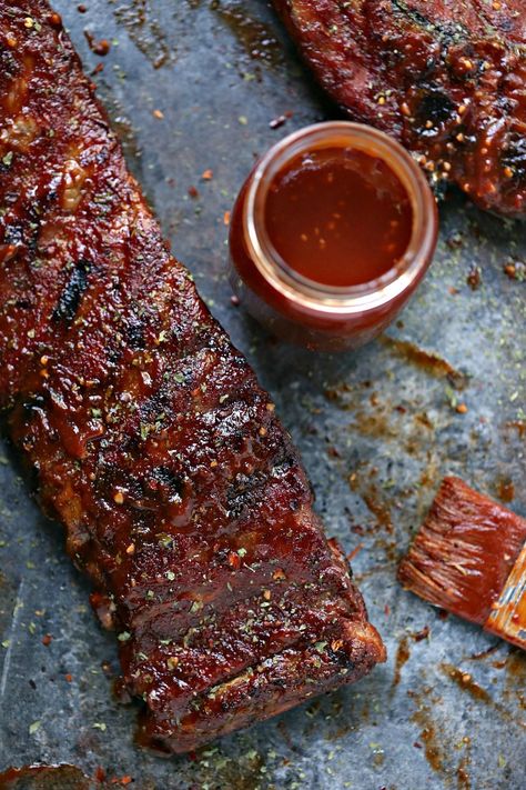 Grilled Ribs with Watermelon BBQ Sauce are super easy to make and pack a serious flavour punch. Your family and friends will be begging for second helpings of this one. Be sure to have extra napkins on hand! #grill #watermelon #ribs #dinner  via @CravingsLunatic Watermelon Bbq, Outdoor Grilling Recipes, Grill Ribs, Grilled Ribs, Grilled Watermelon, Outdoor Cooking Recipes, Easy Main Dishes, Ribs On Grill, Southern Cuisine