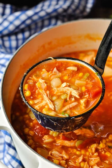 A pride and joy of Virginia culture, Brunswick Stew is a Southern classic that has been enjoyed for hundreds of years! The chicken and tomato-based dish is full of corn, potatoes and beans for a hearty, satisfying and delicious meal. Serve a warm bowl with a side of cornbread for an easy dinner that the whole family will love! Chicken Stew Tomato Base, Brunswick Stew Chicken, Virginia Brunswick Stew Recipe, Brunswick Stew Recipe Easy, Southern Brunswick Stew Recipe, Chicken Brunswick Stew Recipe, Southern Chicken Stew Recipe, Southern Chicken Stew, Brunswick Stew Recipe