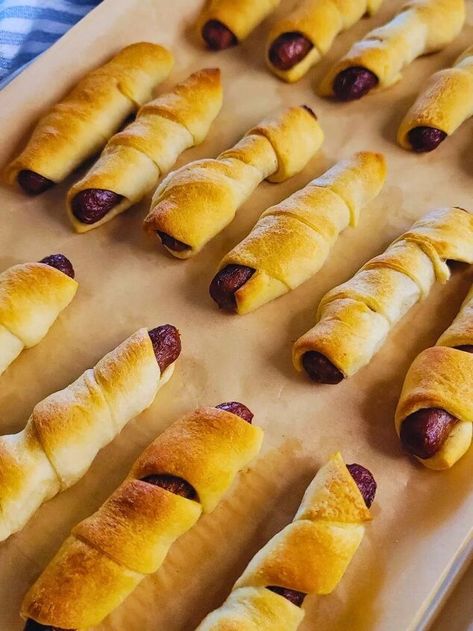 A quick and easy, freezer friendly breakfast option that everyone will love. Breakfast Pigs in a Blanket are created using just two ingredients: crescent dough and breakfast sausage links. They’re ideal for school mornings, brunches, and can be easily frozen for later use.Similar to the traditional pigs in a blanket, these treats are crafted with crescent dough, but instead of lil smokies or hotdogs, they’re filled with breakfast sausage links, making them an excellent choice for bre… Sausage In A Blanket, Breakfast Pigs In A Blanket, Freezer Friendly Breakfast, Pancakes On A Stick, Breakfast Sausage Links, Crescent Dough, Sausage Links, Breakfast Sausage, Crescent Roll Dough