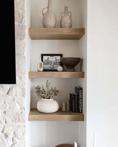 Can you tell we love a styled shelf?⁠ Display your favorite decor pieces or keep everyday essentials within easy reach. Which of these would you want in your home? ⁠ ⁠⠀⠀⠀⠀⠀⠀⠀⠀⠀⁠ 🖤 Alyssa Lane⁠ 🌷 Home Plate Hideaway⁠ 🕯️ Fairway Retreat⁠ 🧺 One Hundred Hills⁠ 🪞 Montevista ⁠ 📖 Alyssa Lane⁠ ⁠⠀⠀⠀⠀⠀⠀⠀⠀⠀⁠ Let us know your emoji pick down below! pc: @lifecreated #livingwithlolo⁠ ⠀⠀⠀⠀⠀⠀⠀⠀⠀⁠ #azdesign #arizonadesigner #scottsdaleinteriordesigner #luxeathome Small Floating Shelf Decor, Shelf Decor Living Room Minimalist, Floating Shelf Styling Living Room, Shelf Decor Living Room Modern, Living Room Floating Shelf Decor, Tv Shelf Decor, Floating Shelf Decor Ideas, Minimalist Shelf Styling, Floating Shelf Decor Living Room