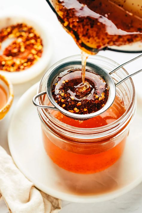 This homemade hot honey recipe is quick and easy to make with 3 ingredients and tastes delicious drizzled on everything from pizza to biscuits, fried chicken, salmon, veggies, baked brie and more! | gimmesomeoven.com Homemade Hot Honey, Honey Brie, Salmon Veggies, Hot Honey Recipe, Dried Peppers, Gimme Some Oven, Incredible Edibles, Hot Honey, Honey Chicken