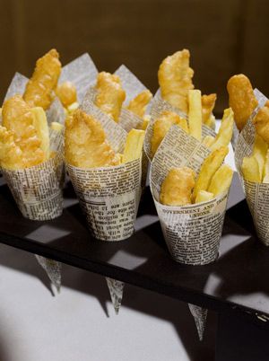 You know how it is, it's been a couple of hours since the main meal and people are getting hungry again. If you don't fancy shelling out for them all to eat another meal and a finger buffet leaves you cold, how about this? Mini portions or fish and chips wrapped in newspaper cones. So cute, easily done and guest's will not be able to resist that mouth-watering salt and vinegar smell! Yummy! Penarth Pier, Wedding Canapes, Fish Shop, Fish N Chips, Wedding Buffet, Food Stations, Waffle Cones, Beef Burgers, Great Appetizers