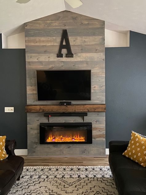 Floating Fireplace Under Tv, Fireplace With Tv Makeover, Fireplace Chase Ideas, Mantel With Fireplace Insert, Diy Fireplace Feature Wall, Wall Mounted Fireplace Electric And Tv, Pallet Wall Fireplace, Faux Fireplace Electric Insert, Tv Over Fireplace Hidden Components