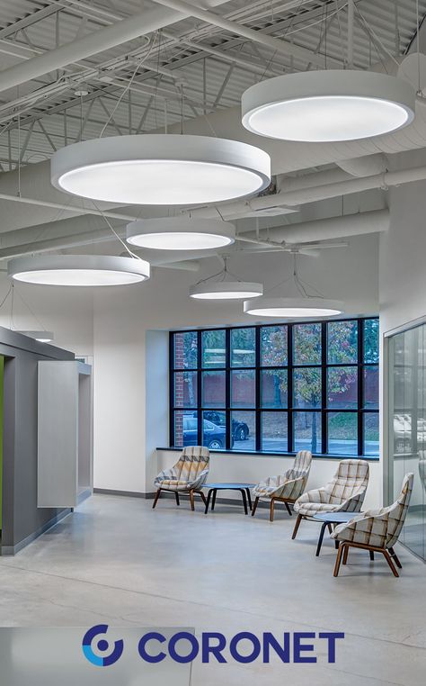 Coronet's PRD LED luminaire helps brings the #GirlScouts of Southeastern Michigan office to light. This modern round, architectural fixture can be installed as a suspended or pendant fixture for open ceiling spaces, or flush surface mounted. Varying sizes available.  Project Photo courtesy of Davis & Davis Interior Design, Farmington Hills, MI  #CoronetLED #ArchitecturalLighting #LEDLighting #LightingDesign #DecorativeLightingOffice Open Ceiling Lighting, Concave Lens, Office Pendant Lighting, Open Office Design, Kitchen Design Showrooms, High Ceiling Lighting, Drop Ceiling Lighting, Low Ceiling Lighting, Open Ceiling