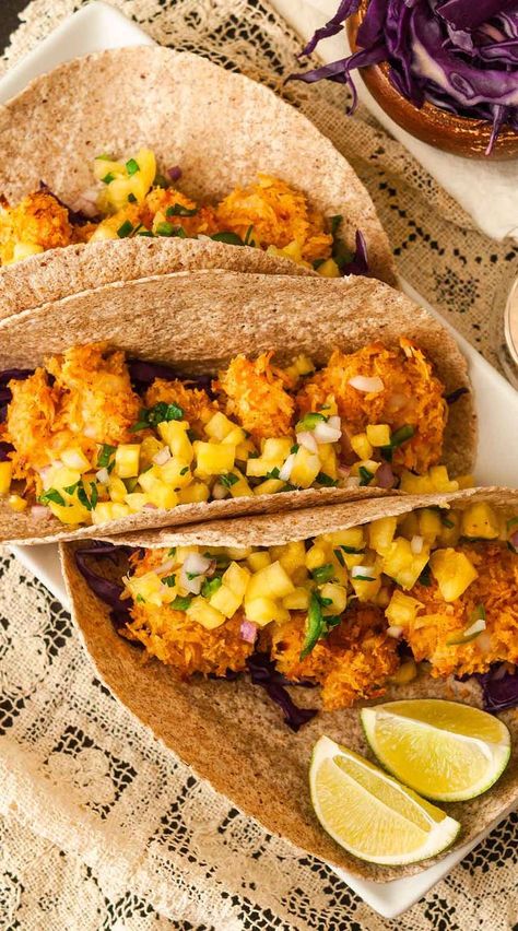 Such an easy dinner recipe! These coconut shrimp tacos are topped with irresistible, easy-to-make pineapple jalapeño salsa, they’re baked, not fried and take only 30 minutes to make! With a little sprinkle of lime and your favorite hot sauce, you won’t believe how much flavor is packed into these gorgeous, spiced coconut tacos! Coconut Shrimp Tacos, Jalapeno Salsa Recipe, Jalapeño Salsa, Creative Meals, Pineapple Shrimp, Super Bowl Food Healthy, Shrimp Taco Recipes, Cafe Rio, Savory Food