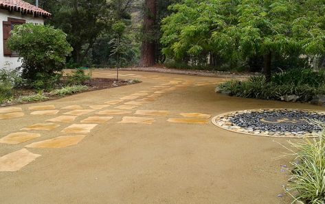 This California Zen landscape was done for a Buddhist retreat in the LA area.  Its refined simplicity adds to the serenity of the natural setting.  Besides the flagstone walkways on top of DG--decomposed granite there is the unique emblem construction.  The center symbol was made of small gravel, while outside of it are different colors of river rocks. In addition to the restful aesthetics of this landscape, the practical benefits are the water savings & low-maintenance needed. Composite Granite Landscape, Backyard Mulch Landscaping, Backyard Reading, Small Water Feature, Buddhist Retreat, California Landscaping, Decomposed Granite Patio, Zen Landscape, Zoysia Grass