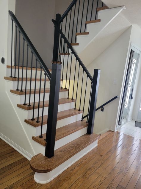 Black Railing Wood Stairs, Farmhouse Black Staircase, White Oak And Black Staircase, Black Railing Stairs Banisters, Black Spindle Staircase, Stair Railing Ideas Black, Black Railings For Stairs, Stairs Black Railing, Black Handrails For Stairs