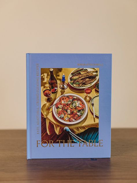 This book teaches you how to plan and prepare great-tasting and impressive-looking menus that are easy to pull off, as well as offers expert advice on toasts, prep-ahead strategies, and tips on handling guest lists and dietary restrictions. With its mix of innovative food presentation and old-fashioned, homestyle technique, For the Table is a testament to the art of the dinner party and looks forward to the festive dinner gatherings of the future. Approximate Dimensions: 10.25" L x 8.25" W x 1" Pretty Cookbooks, Food Book Design, Cooking Book Cover, Cook Book Cover Design, Recipe Book Layout, Aesthetic Cookbook, Coffe Table Book, Coffee Table Book Layout, Cookbook Cover Design