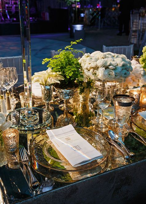 This place setting is made even more opulent with the use of votive candles and a mirrored tabletop. Mirror Table Top Wedding Decor, Mirror Place Setting Wedding, Green Tablescape, Wedding Mirror, Wedding Event Venues, Tent Wedding, Wedding Tablescapes, Lush Green, Green Wedding