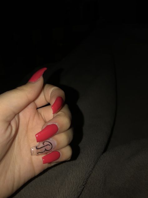 Red with letter r nails Red Nails With Letter Design, Red Acrylic Nails With Letter Design, Red Acrylic Nails Coffin With Initials, Acrylic Nails With R Initial, R Initial On Nails, Red Nail Designs With Initial, Letter R Nails Designs, Letter R On Nails, Nails R Initial