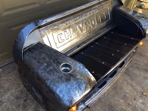 Bare steel,bench made from a 1955 Chevy truck front clip. Black oak seat and 1955 Chevy tailgate. Working headlights and park lights. Made by relics awry. Truck Tailgate Bench, Car Part Art, Tailgate Bench, Car Parts Decor, Old Car Parts, 72 Chevy Truck, Car Part Furniture, Automotive Furniture, Truck Tailgate