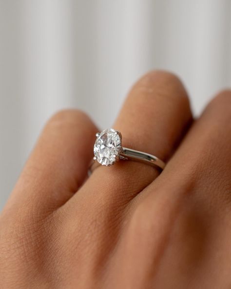 A classic silhouette for a classically beautiful oval solitaire ✨ featuring a lifted cathedral setting, and diamond bridge & hidden halo for an extra but subtle touch of personalisation. Details: - 1.52ct oval diamond - 28 round diamonds for bridge and halo - Platinum - 1.9mm shank #ovalsolitaire #ovalengagementring #customengagementring #engagementringdesign #nz #aus Cathedral Ring Setting, Cathedral Setting, Classic Engagement, Oval Engagement, Classic Engagement Rings, Hidden Halo, Engagement Rings Oval, Custom Engagement Ring, Designer Engagement Rings