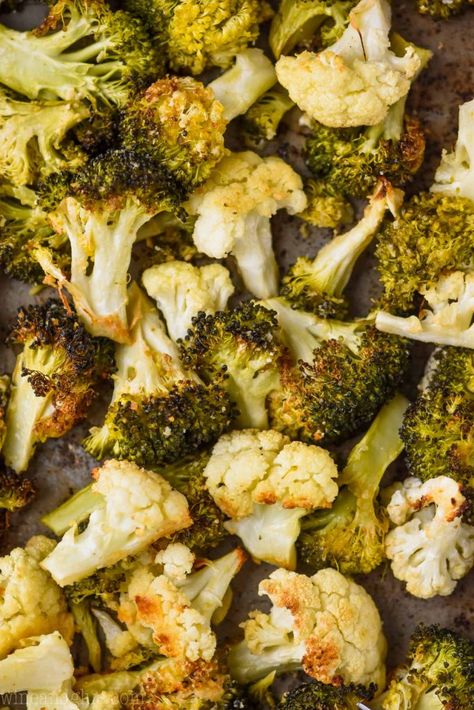 This Roasted Broccoli and Cauliflower is a quick and easy side dish recipe that your whole family will love.  It's easy to customize and change up, making your roasted broccoli and cauliflower with parmesan or even a little lemon.  This is a regular side dish in our house! Cauliflower In Oven, Oven Baked Broccoli, Broccoli Cauliflower Recipes, Roasted Broccoli And Cauliflower, Lemon Broccoli, Seasoned Broccoli, Cauliflower Recipes Healthy, Broccoli Side Dish, Grilled Broccoli