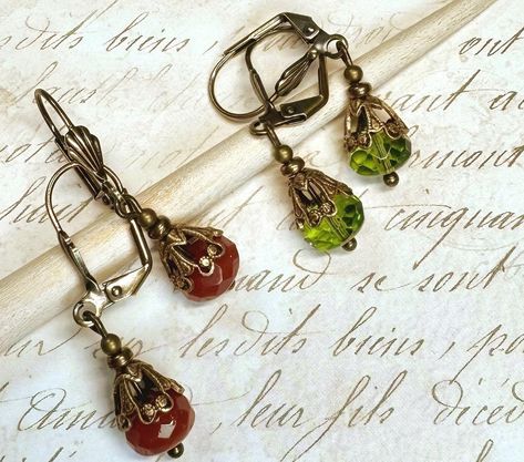 Dainty Antiqued Brass Earrings in a Victorian style. These earrings come in olive green or opaque brown. The earrings are made with antiqued brass accents that are USA made. The earrings come in gift box or gift bag. Fairy Jewellery, Victorian Style Earrings, Victorian Earrings, Brown Earrings, Fairy Jewelry, Vintage Style Earrings, Dress Sketches, Fall Earrings, Earrings Beaded