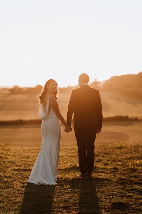 Golden hour couple portrait with the bride in a cowl back wedding dress and groom in a navy suit admiring the views in Kent Mermaid Bride Dresses, Wedding Walk, Golden Hour Wedding, Sunset Wedding Photos, Wedding Photography Ideas, Golden Hour Photos, Golden Hour Photography, Yosemite Wedding, Wedding Details Photography