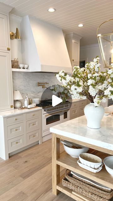 Chelsey Hale Design on Instagram: "A new kitchen with so many favorite design elements:  -calacatta marble countertops and backsplash  -Italian stove  -unlacquered brass hardware and plumbing  -plaster hood  -white oak island and wood floors  -creamy white cabinets in BM Edgecomb Gray   #kitchendesigns #interiordesignerslife #kitchendecorating" Plaster Hood Kitchen With Cabinets, White Kitchen Oak Island, Stove On Island Kitchen, Kitchens With No Upper Cabinets Ideas, Bm Edgecomb Gray, Marble Countertops And Backsplash, White Quartz Countertop Kitchen, Plaster Hood, White Kitchen Hood