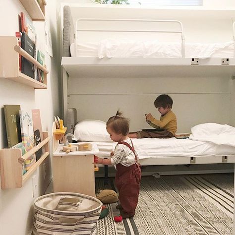 Shared Montessori bedroom for siblings. Bunkbeds, open-face book shelves at child height and minimal toys. This family lives in a 600 square foot home! Wall Bunk Beds, Bunk Bed Wall, Safe Bunk Beds, Resource Furniture, Bedroom Book, Bunk Beds Built In, Built In Bunks, Cool Bunk Beds, Small Bed