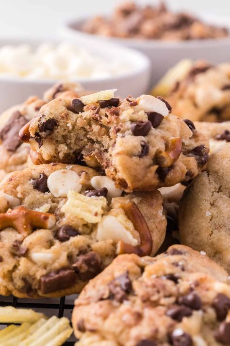 These soft and chewy kitchen sink cookies are filled with chocolate, potato chips, pretzels, and toffee (everything but the kitchen sink!). Best Kitchen Sink Cookies, After School Cookies, Trashcan Cookies Recipe, Chocolate Chip Pretzel Cookie Recipe, Chocolate Chip Pretzel Cookies, Everything Cookie, Everything Cookies, Everything But The Kitchen Sink Cookies, Kitchen Sink Cookies Recipe