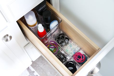 I'm sharing all of my favorite master bathroom organization ideas and some easy updates that we've done to take our master bathroom from cluttered and boring to organized and beautiful! | bathroom organization, organized bathroom vanity, how to organize a bathroom, how to organize deep vanity drawers, organized hair supplies, shaving tools organization, organized hair ties and supplies in bathroom vanity drawer Bathroom Vanity Organization Ideas, Abby Lawson, Small Drawer Organizer, Hunt House, Deep Drawer Organization, Diy Bathroom Storage Ideas, Organization Vanity, Bathroom Vanity Organization, Bathroom Organization Ideas