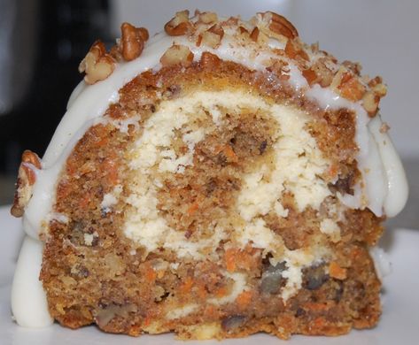 Carrot Bundt Cake with Cheesecake Filling and Cream Cheese Frosting - StolenRecipes.net Cake With Cheesecake Filling, Carrot Bundt Cake, Bunt Cake Recipe, Carrot Cake With Pineapple, Baked Food, Comfort Soup Recipes, Spice Cake Mix, Cake Recipes From Scratch, Cheesecake Filling