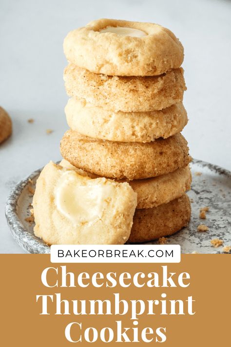 Cheesecake Thumbprint Cookies are soft cookies filled with sweet cheesecake. Roll them in cinnamon-sugar for a tasty variation. Thumbprint Cheesecake Cookies, Cinnamon Thumbprint Cookies, Cheesecake Thumbprint Cookies, Cheesecake Cookies Recipes, Thumbprint Cookie, Soft Cookies, Thumbprint Cookies Recipe, Cookie Brownie Bars, Cheesecake Cookies