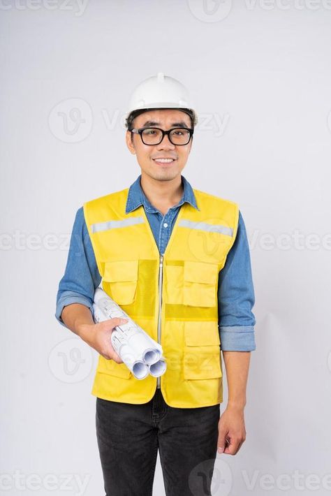 Smiling young asian civil engineer wearing helmet hard hat standing on isolated white background. Mechanic service concept. Engineer Costume, Engineering Careers, Costume Making, Wooden Toys Plans, Civil Engineer, Hat Stands, Icon Set Vector, Civil Engineering, Vintage Paper