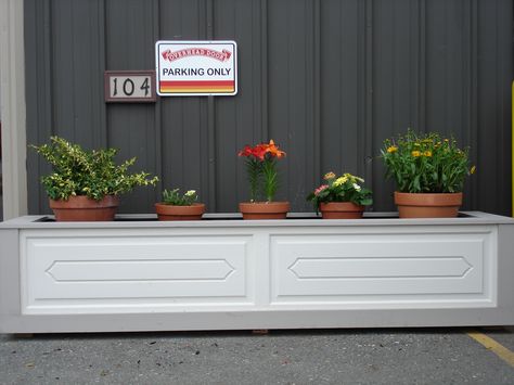 We made a set of matching planters out of an old wood garage door from the 50's Louvered Bifold Doors, Homemade Photo Frames, Canada Saskatchewan, Garage Door Ideas, Garden Screens, Garage Door Panels, Wood Garage, Old Wood Doors, Doors Diy