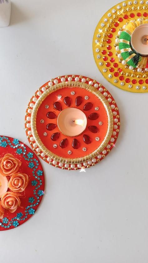 DIY holder made from CD , checkout the video on the link 💞 Cd Diya Decoration, Diya Holders Diy, Botal Painting, Diwali Candle Holders, Diya Holder, Super Clay, Diwali Diyas, Diya Decoration Ideas, Handmade Decorative Items