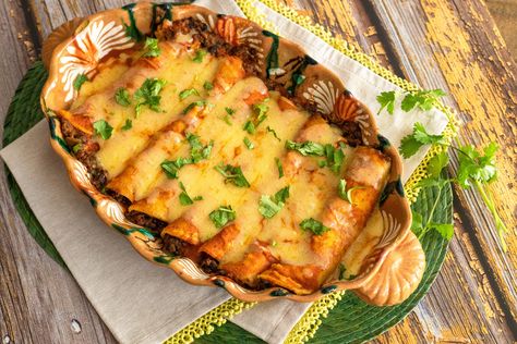 Black Bean and Chorizo Enchiladas Chorizo Enchiladas Recipes, Chorizo Dishes, Chorizo Enchiladas, Roasted Green Chili, Enchilada Ingredients, Enchilada Bake, Mexican Chorizo, Black Bean Enchiladas, Chorizo Recipes