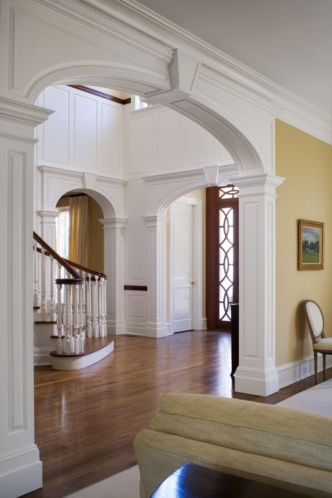 Entry | Mockler Taylor Architects Interior Arch Design, Wainscoting Around Arches, Arch Box Molding, Archway Design, Entrance Arch Design, Pillar Moulding Design, Arched Colonnade, Arches In Homes, Interior Arches And Columns