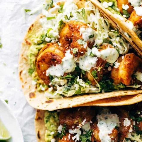 The Best Shrimp Tacos with Garlic Cilantro Lime Slaw - ready in about 30 minutes and loaded with flavor and texture. SO YUM! #tacos #tacotuesday #shrimp | pinchofyum.com Summer Shrimp Tacos, Shrimp Tacos With Cilantro Lime Sauce, Jerk Shrimp Tacos, Grilled Shrimp Tacos Recipe, Taco Slaw, Best Shrimp Taco Recipe, Cilantro Lime Shrimp Tacos, Grilled Shrimp Tacos, Lime Slaw