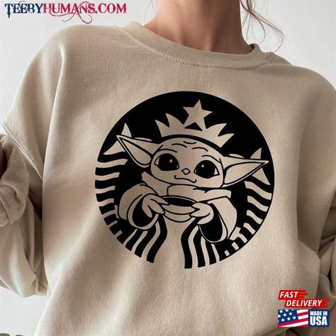 Starbucks Baby Yoda Shirt Coffee Hoodie T-Shirt Classic Check more at https://teebyhumans.com/product/starbucks-baby-yoda-shirt-coffee-hoodie-t-shirt-classic/ Coffee Hoodie, Yoda Shirt, Cricket Ideas, Tee Shirt, All Products, Tee Shirts, Cute Outfits, Coffee, Disney