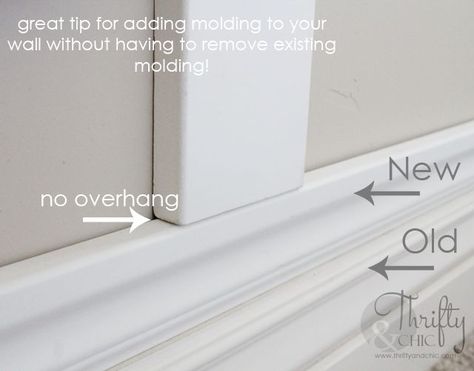 Great trick to have board and batten sit evenly on baseboards without having to remove existing baseboards! Board And Batten Wall, White Fireplace, Young House Love, Board And Batten, Wainscoting, Basement Remodeling, Diy Home Improvement, Baseboards, Decorating On A Budget