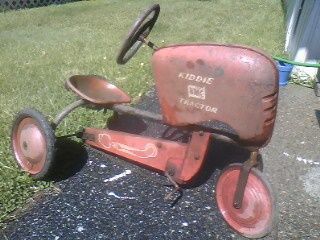 1950's BMC Pedal Tractor | Collectors Weekly Toy Pedal Cars, Pedal Tractor, Tractor Art, Vintage Pedal Cars, Pedal Car, Riding Toys, Wonder Years, Old Tractors, Foose