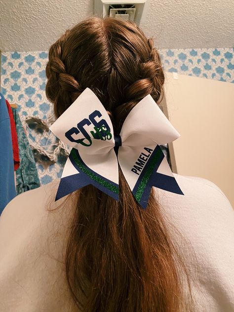 Cheer Low Ponytail, Cheer Hairstyles With Bows Ponies, Braid Into Low Ponytail Cheer, Cheer Hair Braids, Cute Cheer Ponytails, School Cheer Hairstyles With Bows, Competition Hair Cheerleading, Low Cheer Ponytail With Bow, Comp Cheer Hairstyles