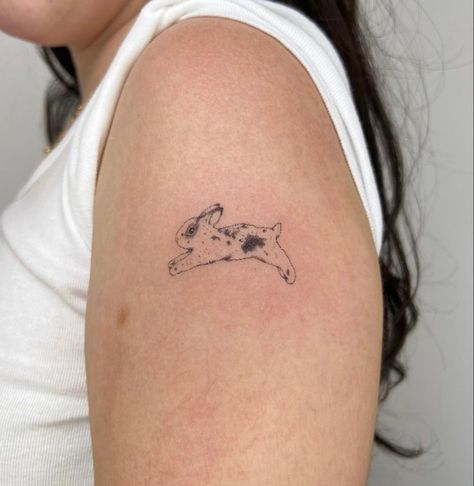 Hopping Bunny Tattoo, Rabbit Tattoo Placement, Soft Bunny Tattoo, Bunny Jumping Tattoo, Rabbit Fine Line Tattoo, Lop Eared Bunny Tattoo, Bunny And Cat Tattoo, Jumping Rabbit Tattoo, Dainty Pet Tattoos