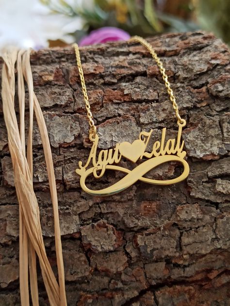 Excited to share the latest addition to my #etsy shop: infinity necklace with two names, infinity necklace, name pendant, personalize necklace,heart name necklace, valentine gift, gift necklace #gold #infinity #women #yes #silver #personalizedsilver #personalizedjewelry #personalizeinfinite #namesilver https://etsy.me/2Ac5vba Name Pandent With Chain Gold, Chain Name Design, Mangalsutra With Name, Couple Name Pendant Design, Name Mangalsutra Designs Gold, Name Chain Gold Design, Gold Name Pendant Designs, Name Pendant Design, Names Necklace Gold