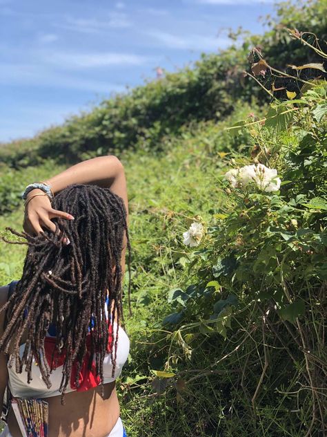 this is a picture of a black woman with locs standing in front of a larger green bush in a sailor moon bathing suit. her hair is lighter brown at the ends as a result of using lemon juice to naturally lift color over time Bleached Locs, Bleached Hair, Loc Styles, Lemon Juice, Locs, Hair Inspo, This Summer, Juice, Bleach