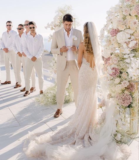 Bride and groom say do personal vows Groom Sand Suit, Cream Color Groom Suit, Groomsmen Suits Beach Wedding, Beige Suit For Groom, Tan Suites Wedding, Light Beige Groomsmen Suits, Bride And Groom White Attire, Beachy Groomsmen Attire, White Bride And Groom Attire