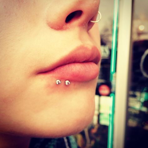 Double labret piercing by Hayley with Industrial Strength jewelry. Double Labret Piercing, Pierced Lips, Side Labret, Emo Tattoos, Body Decor, Face Piercings, Labret Piercing, Piercing Inspo, Lip Piercing