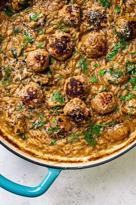 One pot Swedish meatballs with orzo – tasty pork meatballs cooked in a rich gravy with orzo pasta and finished with cream and Parmesan. Delish Swedish Meatball Orzo, Orzo Meatballs, Meatball Orzo Soup, Meatballs Orzo, Meatball Orzo, Meatball Pasta Recipes, Breakfast Soup, Meatball Pasta, Orzo Soup